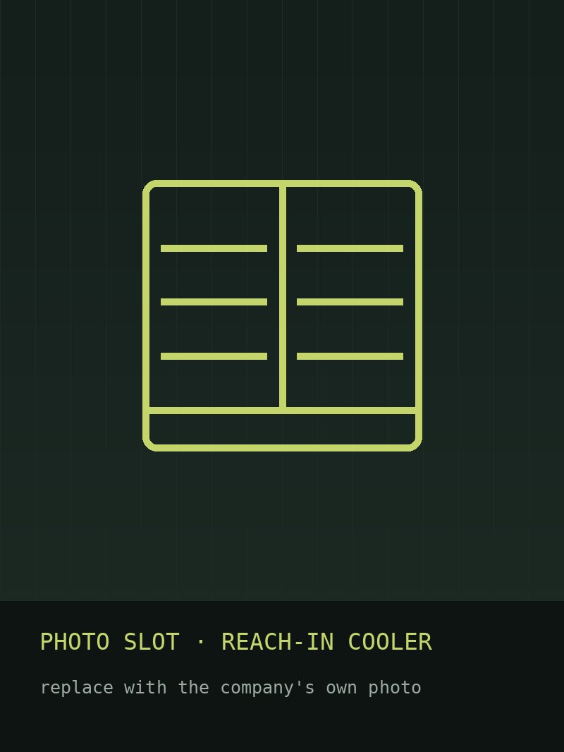 Two-door commercial reach-in cooler in a kitchen line